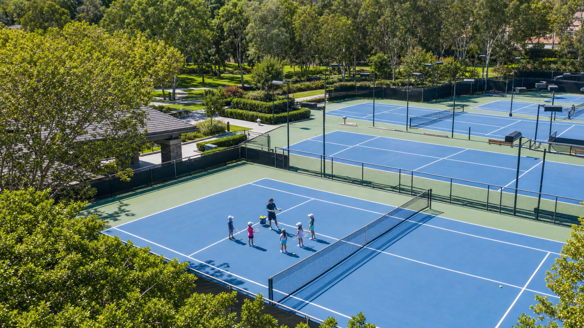 Aerial view of community tennis courts at a park