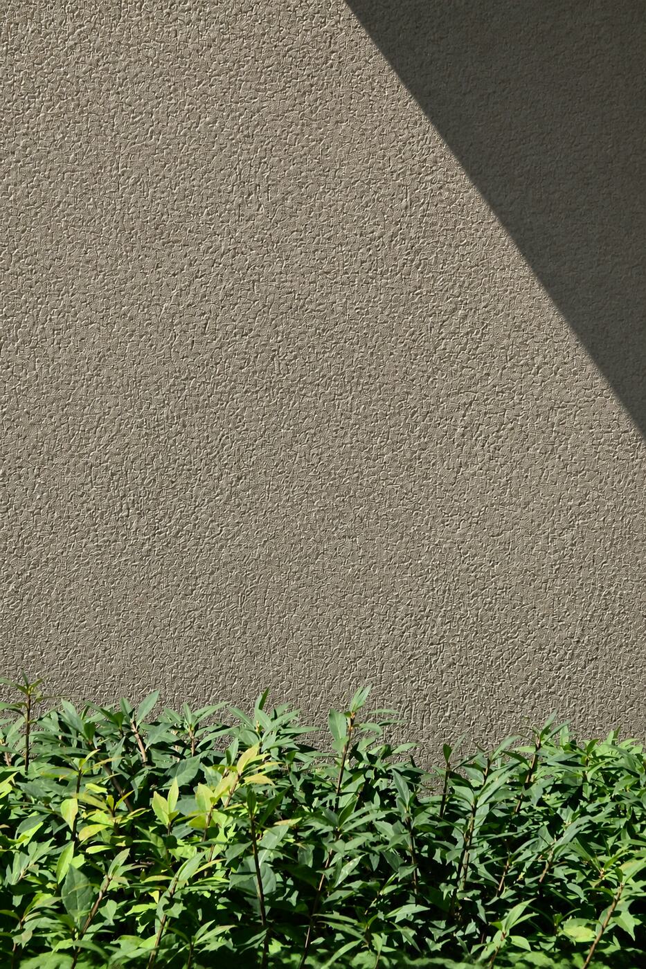 After painting stucco - repaired re-textured and painted to a uniform seamless finish