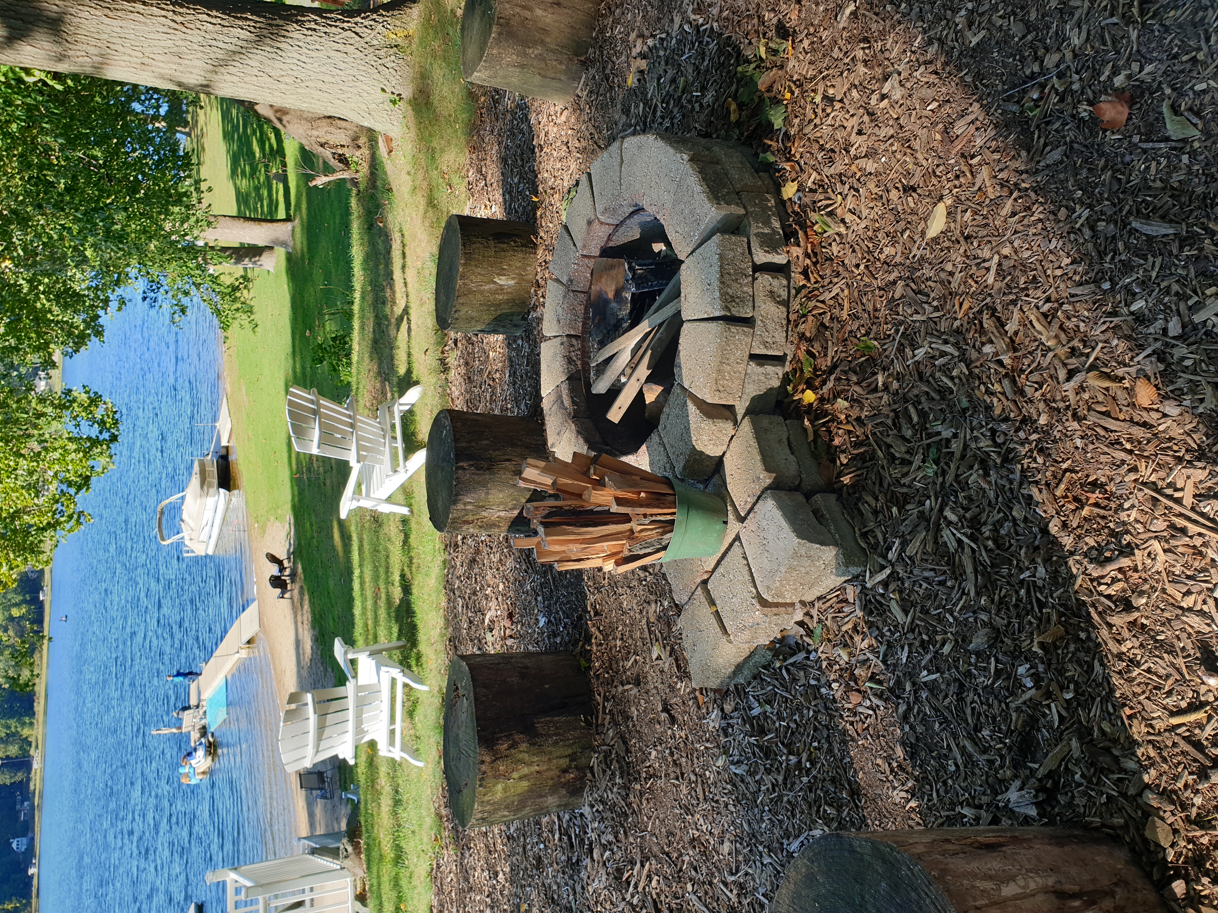 Lakeside fire pit with dock, and beach