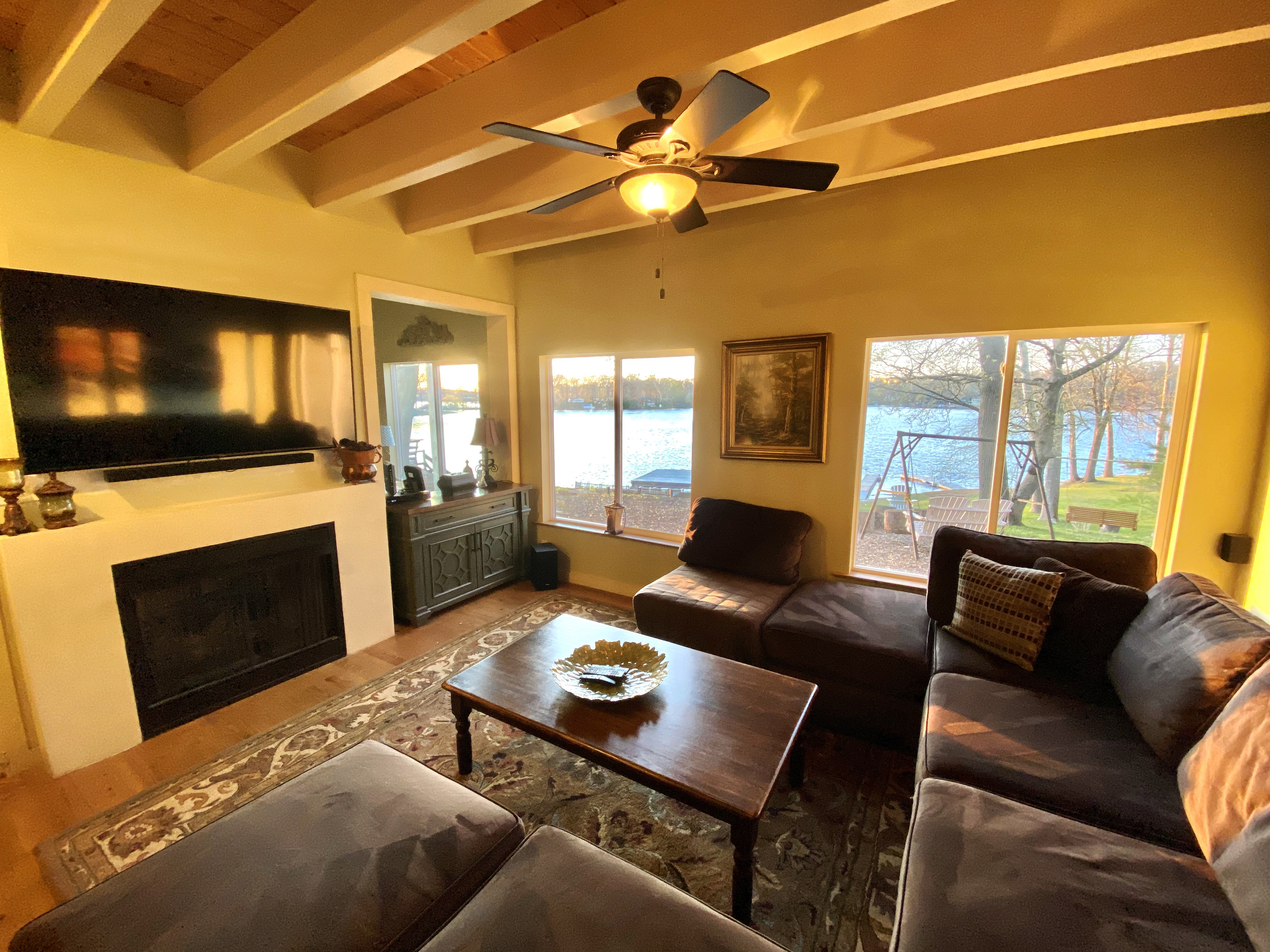 Bright living room with lake views