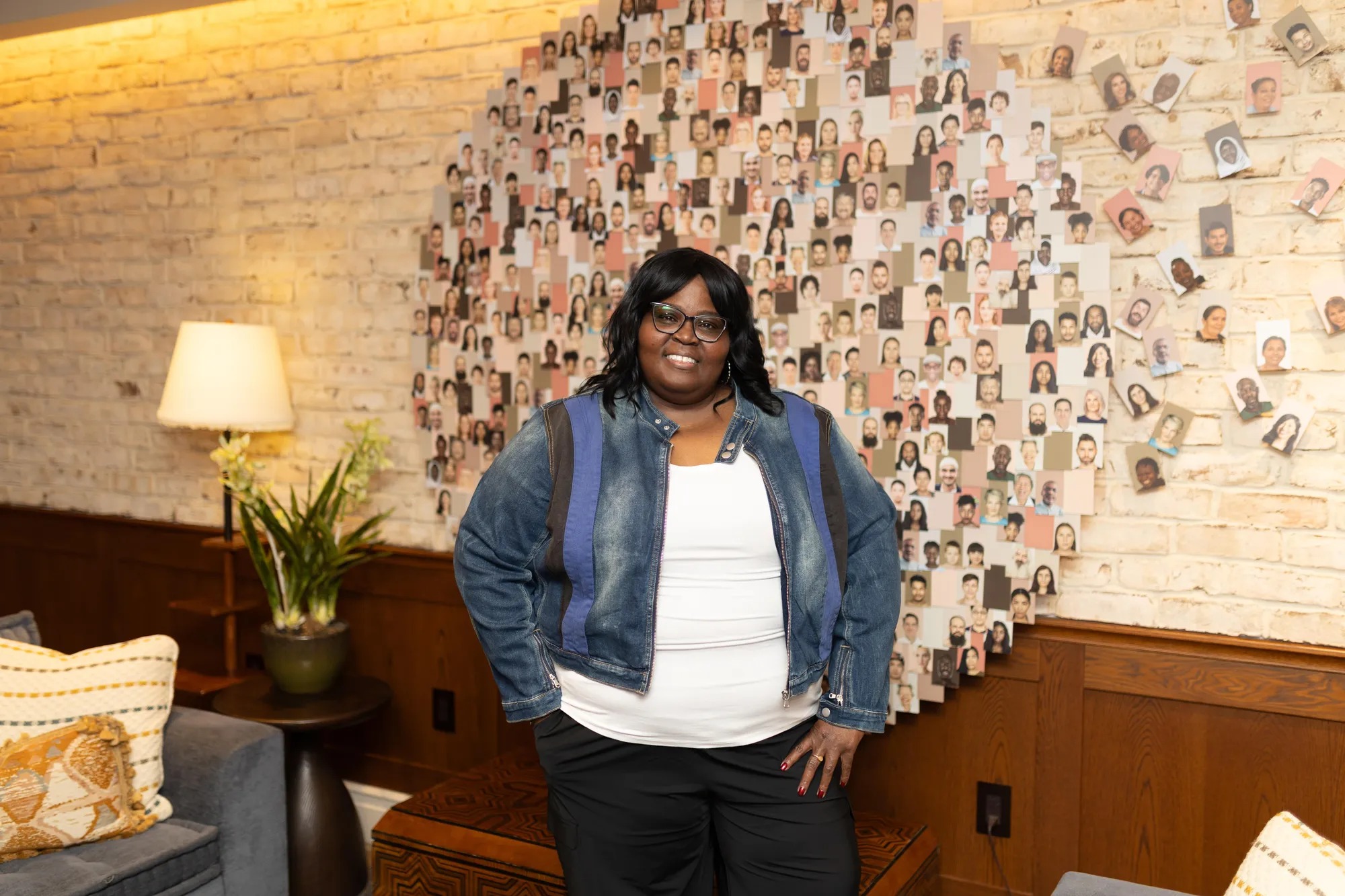 Tiesha Green with her wall of photos